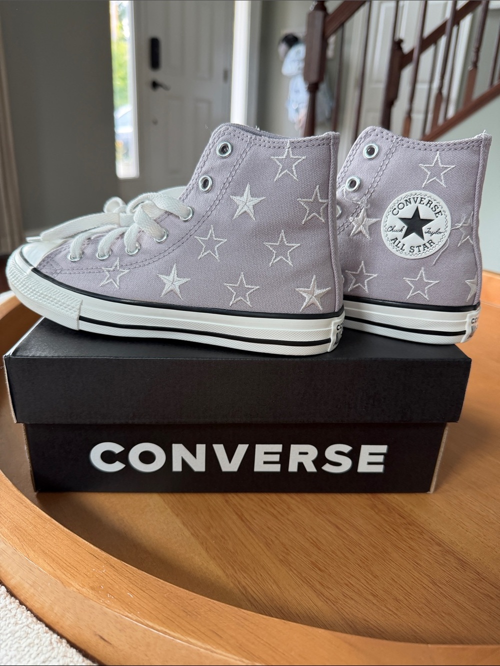 Converse girl’s high top sneakers.  Brand New!  Size 2